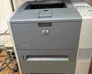  HP LaserJet 2430n Workgroup Laser Printer: High Speed Networked Printing.