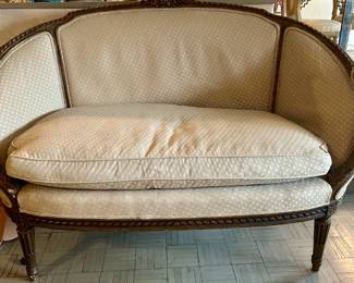 French love seat -,55 inches wide, 37 inches tall at the highest part.