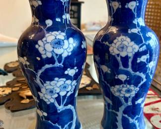 Pair of Chinese blue and white lotus blossom vases - double ring on base. One as is.