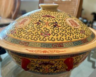 Chinese porcelain covered bowl. Hand painted . The cover becomes the serving dish.
