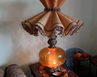 Note the internal  lighted glass on this lamp