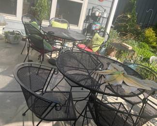 Several outdoor furniture table sets 