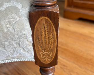 detail of leg of armchair
