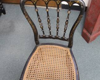 Black lacquer occasional chair with inlay