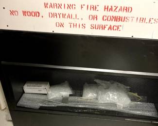 . . . fireplace -- NEW, NEVER USED -- retailed for $6,000
