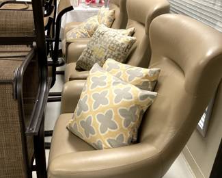 . . . leather salon chairs -- 100 percent leather