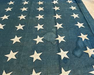 Huge early 48 star American flag, 8’ x 15’, all stitched with appliqué stars, some minor water stains, c 1912-1917, around 1918 federal law stated that all US flags are to be in straight rows and columns and this flag is staggered, linen