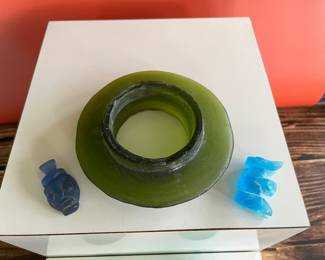 A collection of very early Southeast Asian carved glass bracelets and amulets