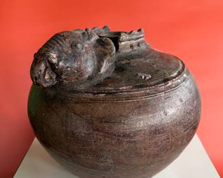 Khmer 12th century pot with elephant decoration on the lid, pottery with bronze colored glaze