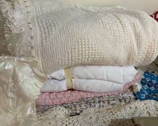 Crocheted bedspread/table cloth.  People are using them for both. Chanelle Bedspread