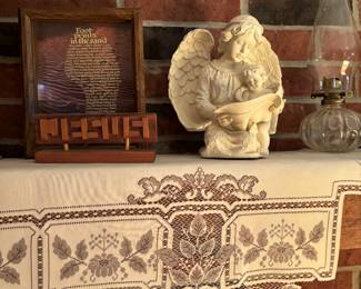 Beautiful lace runner, wonderful figurines through out property