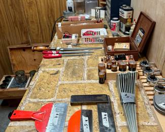 Shelving braces, paint and sheetrock scrapers, locks, files