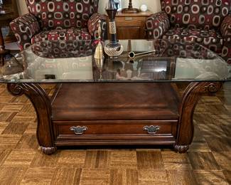 Wonderful Coffee Table. Beveled Glass Top. 2 Side Chairs with graphic upholstery. Excellent condition