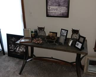 Metal/Stone Sofa Table with a Variety of Picture Frames and Decor
