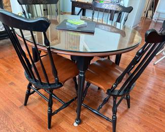 Table and chairs with two leaves