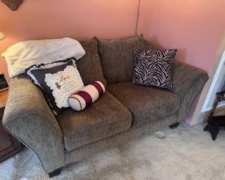 Modern like-new condition two seat sofa... perfect for a small space and easy to move due to its light-weight!