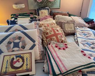 Quilted pillow shams and decorative throw pillows