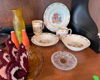 Peter Rabbit china dishes (so sweet!), cut-glass trays, amber depression glass bowl, orange geometric salt and pepper shakers