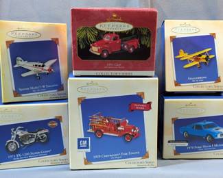 Hallmark Keepsake Collector's Series Ornaments Including 1953 GMC, Spartan Model 7-W Executive, 1970 Ford Mach I Mustang, Staggerwing And More, Total Qty 6, All In Boxes