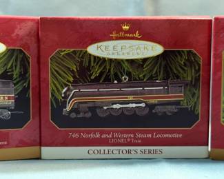 Hallmark Keepsake Collector's Series Ornaments Including 1950 Santa Fe F3 Diesel Locomotive, Qty 2, Blue Comet 400E Steam Locomotive, The Tender Lionel 746 Norfolk and Western And More, Total Qty 8, All In Boxes