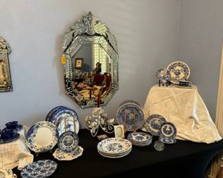 Victorian inspired etched glass mirrors, variety of pretty blue and white plates.