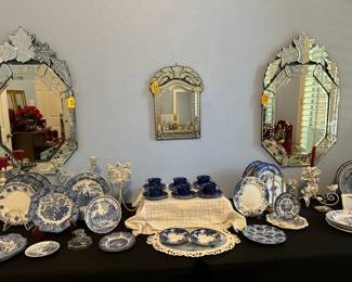Victorian inspired etched glass mirrors, variety of pretty blue and white plates.