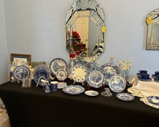 Victorian inspired etched glass mirrors, variety of pretty blue and white plates.