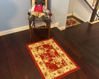 Several bright, happy area rugs