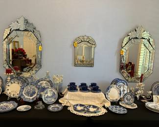 Victorian inspired etched glass mirrors, variety of pretty blue and white plates.