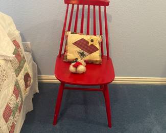 Cute red wooden spindle back chair