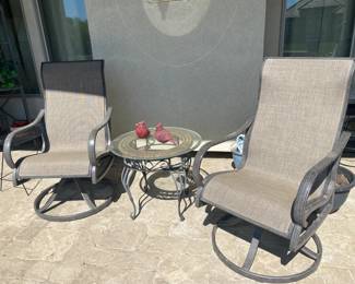 Pair of Swivel Patio Chairs and Small Table