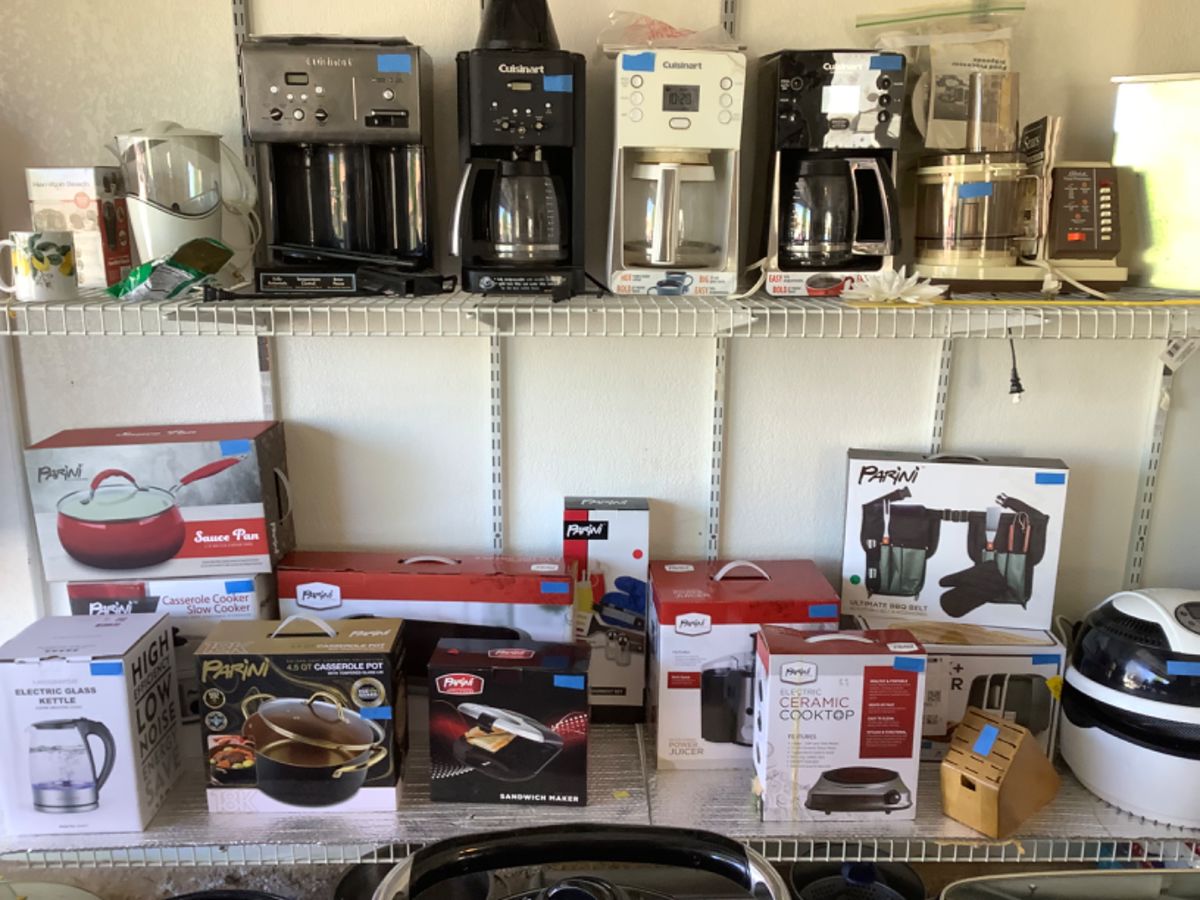 Many kitchen appliances with some still in the box, never used.
