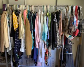 Blouses, jackets, and dresses.  Many still tagged.