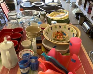 Pots, pans, utensils, bowls, and platters.