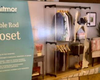 Two double rod closet organizers.