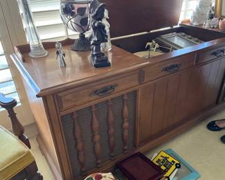 Beautiful entertainment console with record player.