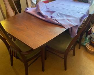 . . . walnut table and chairs