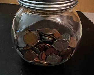 Jar with Buffalo nickels and copper wheat and Lincoln pennies 