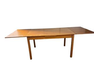 $360 USD    Mid Century Modern Furbo Teak Extension Table Danish EK221-92    Embrace the timeless elegance of Danish design with our Mid Century Modern Furbo Teak Extension Table. Crafted with premium teak wood, this table exudes sophistication and versatility. Perfect for intimate dinners or large gatherings, it seamlessly extends to accommodate all your needs. Experience luxury at its finest.
Condition:  Very good for age.  Some marks as shown in photos.
Dimensions:  51 x 33 x 29"H open
Local pick up Merrifield, VA.  Contact us for shipper suggestions.      https://goodbyhello.com/products/copy-of-white-formica-mid-century-table-ek221-91?_pos=51&_sid=2469c3f2f&_ss=r