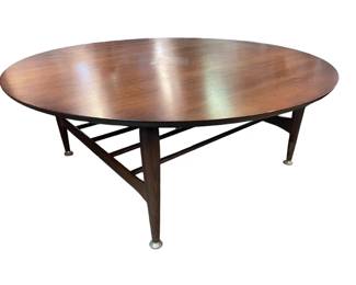 $600 USD     Mid Century Modern Scandinavian Round Coffee Table w Inlay EK221-5    Large 1940s Scandinavian Coffee Table. Storage underneath. This is a very high quality table. Beautiful, round, mid century coffee table with classic, modern lines. Slated shelving provides for additional storage. An inlaid pedal design, adds subtle detail.
Dimensions: 40 x 40 x 15"H
Condition: Very good.
Local pick up Merrifield, VA.  Contact us for shipper suggestions.     https://goodbyhello.com/products/copy-of-mid-century-pleather-seat-booth-ek221-4?_pos=67&_sid=2469c3f2f&_ss=r
