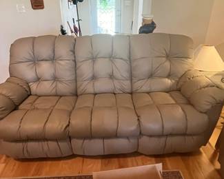 $ 350 each one of two matching faux leather reclining sofas reclines at both ends 85W x 34D x 40 H