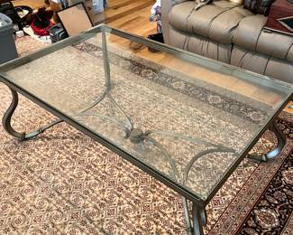 $90 Coffee table Glass and wrought iron 53W x  32D x  20H
