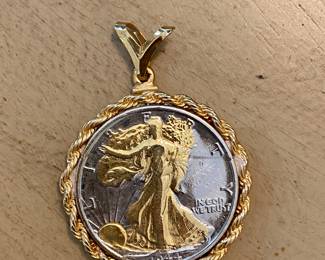 $48 Liberty coin 1984 in gold plated rope bezel 