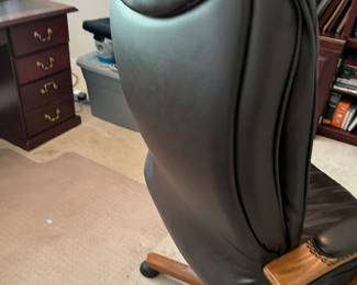 $60 Desk chair leather and wood 28W x 22D x 48H some arm scuffs