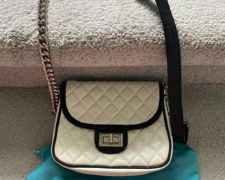 #100 - $60 - Tiffany & Fred small white & purse 
