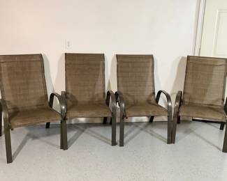 NIAB806 Four Patio Chairs Set of four patio chairs with curved armrests and flexible&nbsp;synthetic seats and backs. Chairs measure approximately 40" tall at the tip of the back, 16" tall at the seat, 16" wide, and 25" deep.
