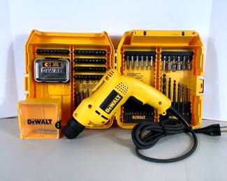 NIAB217 DeWalt Drill With Attachments Cord Dewalt 3/8" VSR drill, Model # D21007. Comes with drill bits &nbsp;and attachments. Drill was tested and works.
