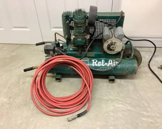 NIAB801 RolAir Electric Air Compressor Electric Air Compressor from Rol-Air. Tested and builds air pressure. Set up for wheelbarrow-like transport. Includes a hose.
