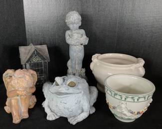 NIAB811 Garden Art And Flower Pots Assortment of garden art and flower pots. Includes sleeping and standing cherubs, frog statue, and two flowerpots. Floral flowerpot is made in Italy.
