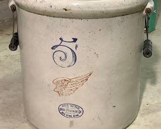 NIAB812 Antique 5 Gal Red Wing Ceramic Crock 5 Gallon Ceramic Crock from Red Wing Pottery. Measures 13" tall by 12.5" in diameter. Has wooden handles.
